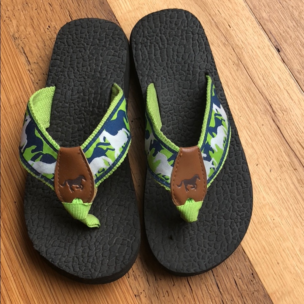 Clean, like new horsie flip flops